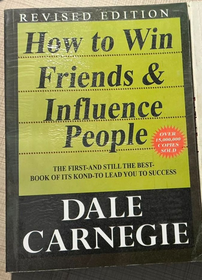 How to win friends and influence people by Dale Carnegie